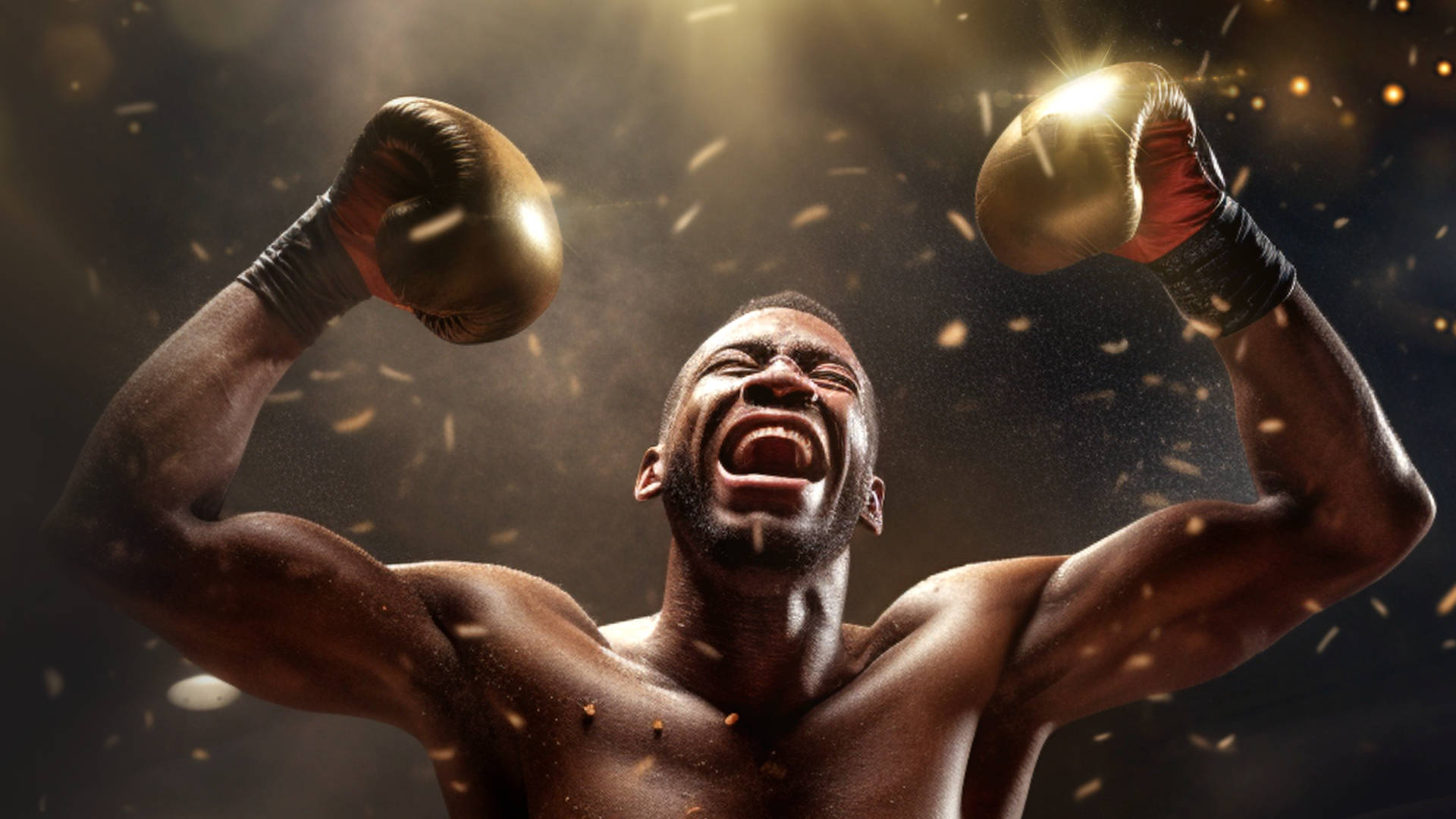 Boxer raising arms in victory